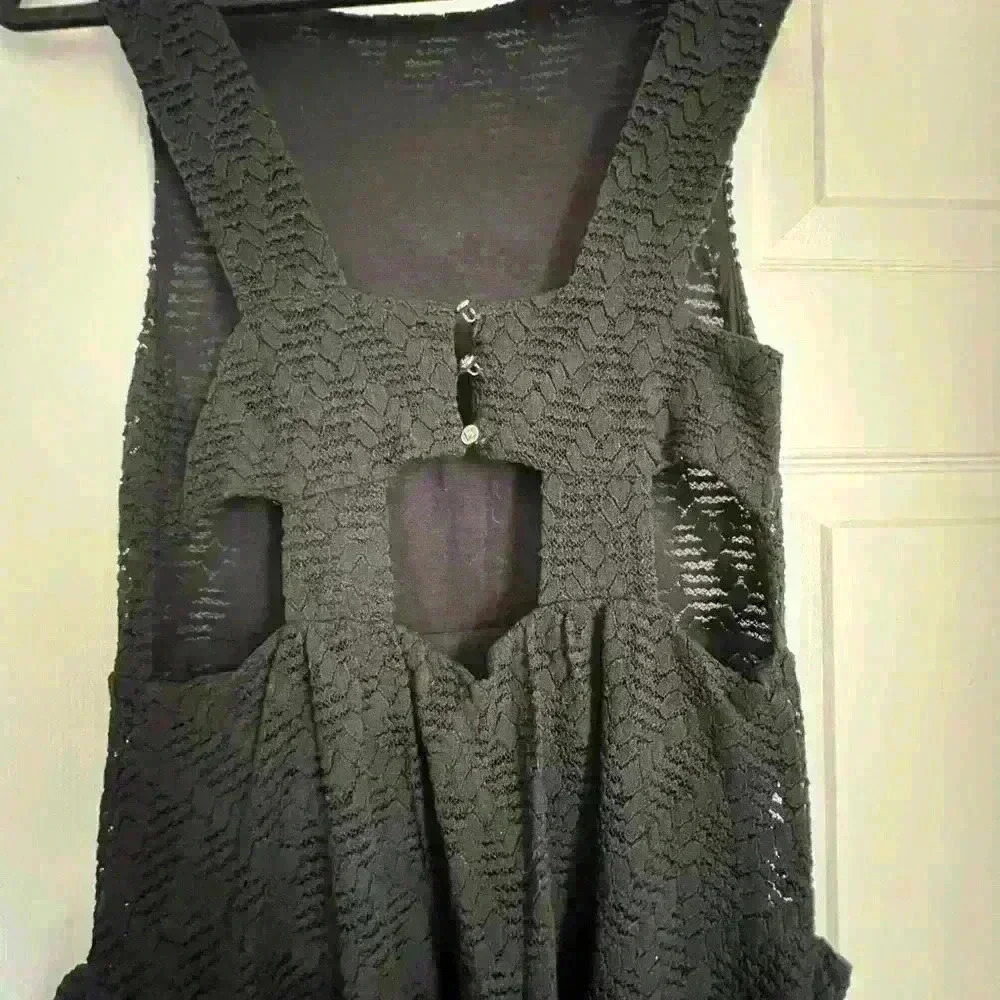 Free people black dress with cutout on the side and in the back. Size is XS/S. - Picture 9 of 12